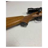 Winchester pre-64 .300 bolt action rifle with Redfield scope