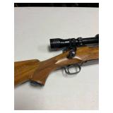Winchester pre-64 .300 bolt action rifle with Redfield scope