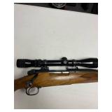 Winchester pre-64 .300 bolt action rifle with Redfield scope
