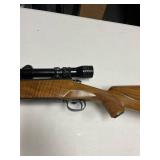 Winchester pre-64 .300 bolt action rifle with Redfield scope