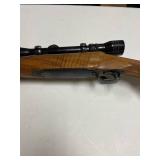 Winchester pre-64 .300 bolt action rifle with Redfield scope