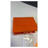 Lyman and other assorted orange and yellow plastic ammo cartridge boxes
