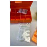 Lyman and other assorted orange and yellow plastic ammo cartridge boxes