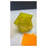 Lyman and other assorted orange and yellow plastic ammo cartridge boxes