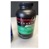 Winchester 231 ball powder (1 mostly full other is 1/4 full)