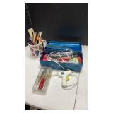 Metal toolbox with craft supplies and more