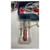 Metal toolbox with craft supplies and more