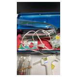 Metal toolbox with craft supplies and more