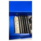 Assorted magazines and speed loaders