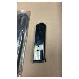 Leupold ring wrench with Smith & Wesson .45 magazine