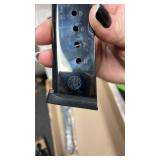 Leupold ring wrench with Smith & Wesson .45 magazine