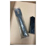 Leupold ring wrench with Smith & Wesson .45 magazine