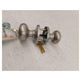 Kwikset SmartKey Security Satin Nickel Entry Knob KW1 2-3/4 in.