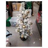 Flocked Christmas Tree with Gold Ornaments in Black Basket 42 inches With Lights