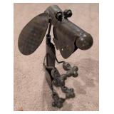 Metal Dog Sculpture on Roller Feet