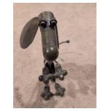 Metal Dog Sculpture on Roller Feet