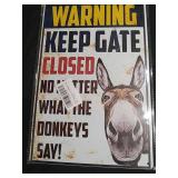 Humorous Warning Sign with Donkey