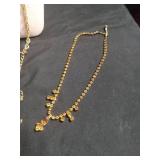 Gold Tone Necklace Collection with Floral Pendant
