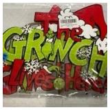 The Grinch Merry Christmas and The Grinch Lives Here Wall Sign