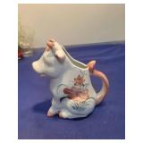 Ceramic Smiling Cow Figurine with Floral Design