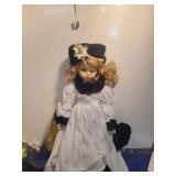 Porcelain Doll in White Winter Dress with Black Fur Trim