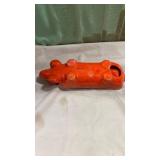 Orange Speckled wiener, dog cracker holder