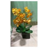 Orange Orchid in Black Ceramic Pot