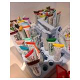 Tri-chem products tube paints in storage caddy and tips