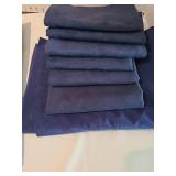 Navy blue fabric and a Cherry Orchard banner in a lined basket