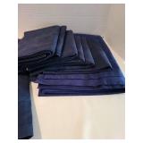 Navy blue fabric and a Cherry Orchard banner in a lined basket