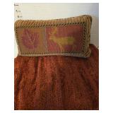 Throw blanket and throw pillow