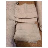 King-sized comforter, 2 pillow shams, 2 toss pillows and a bedskirt, very pale mint color