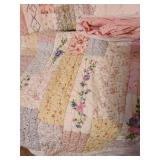 Full/Queen quilt, with 3 standard size pillow shams and a bed skirt.