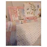 Full/Queen quilt, with 3 standard size pillow shams and a bed skirt.
