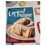 Anchor Hocking and Pyrex baking dishes with lids, cookbook, refrigerator magnets.