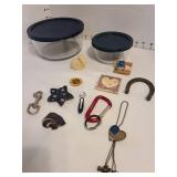 Anchor Hocking and Pyrex baking dishes with lids, cookbook, refrigerator magnets.