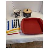 Red silicone baking dish, wooden coffee filter container, mug and more.