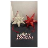 Large star ornaments and snowman Noel