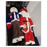 Large snowman and Santa decor, both about 4ft tall and come with zippered storage bags