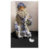 Santa Claus and Snowmen statue in blue and white