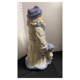 Santa Claus and Snowmen statue in blue and white