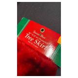 Tree skirts, one is 46in diameter and new one is 48in diameter