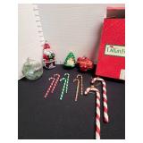 6 glass candy canes and Christmas ornaments.