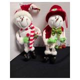 Paur of adorable posable snowmen, 12 inches high.