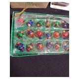 Christmas ornaments, string lights, sleigh decor.