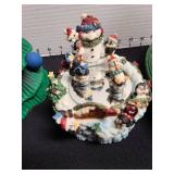 Musical penguin ice skating figure, wooden tree 15in tall, ceramic bowl, red pinecones. Bowl has chipped rim