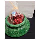 Musical penguin ice skating figure, wooden tree 15in tall, ceramic bowl, red pinecones. Bowl has chipped rim