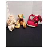 Holiday decor of Santa, Russ bear, red mouse.