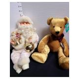 Holiday decor of Santa, Russ bear, red mouse.