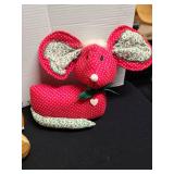 Holiday decor of Santa, Russ bear, red mouse.